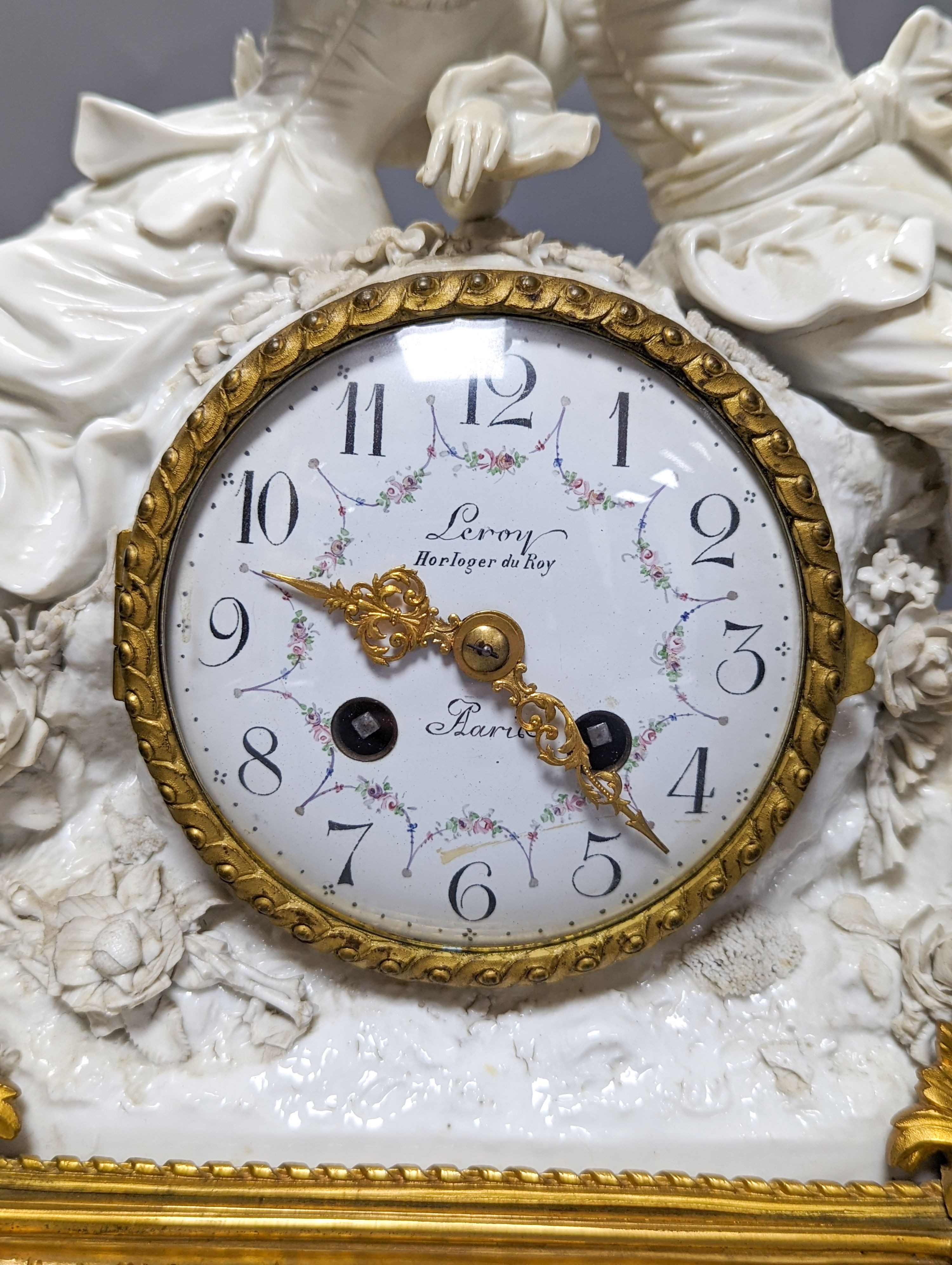 A late 19th century ormolu mounted Naples white porcelain mantel clock, width 30cm height 32.5cm